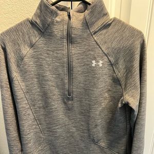 Women’s Under Armour half zip pullover.